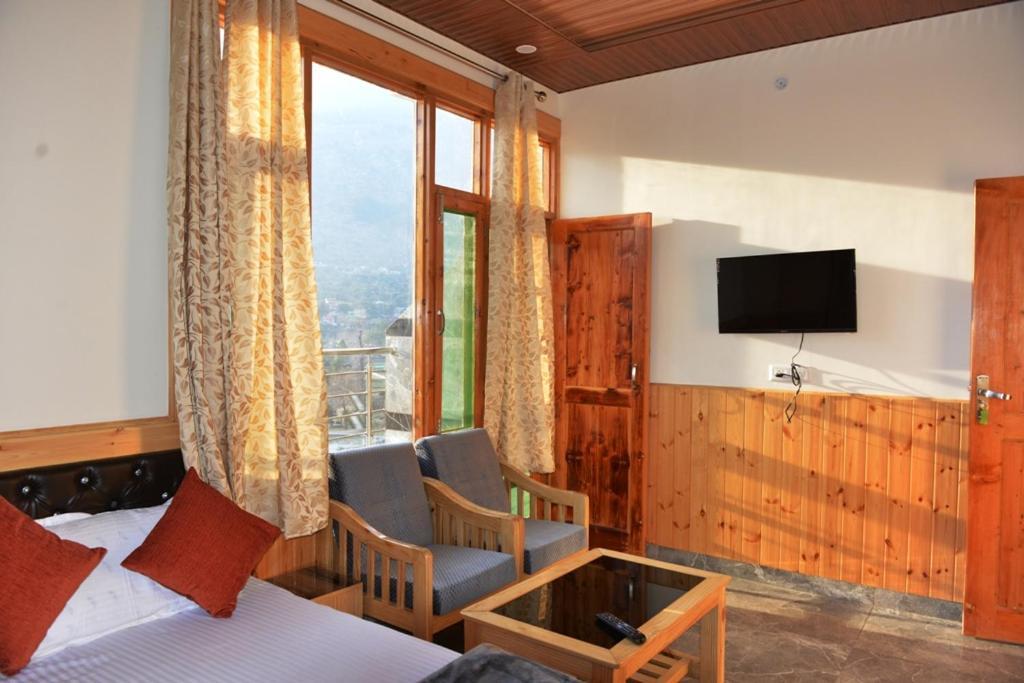 Tulip Flowing River View Hotel. Shamshi Exterior foto